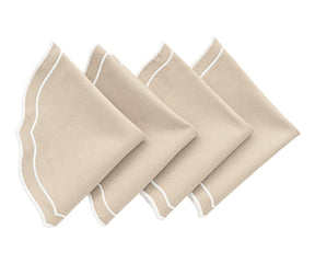 Close-up of scalloped edge on light beige cotton placemat