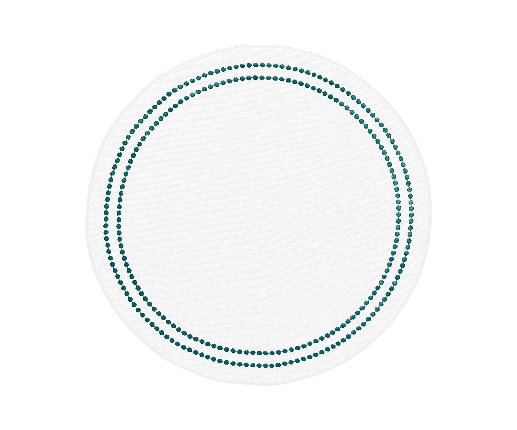 Green round cotton placemats with embroidered design and pearls accents on a dining table