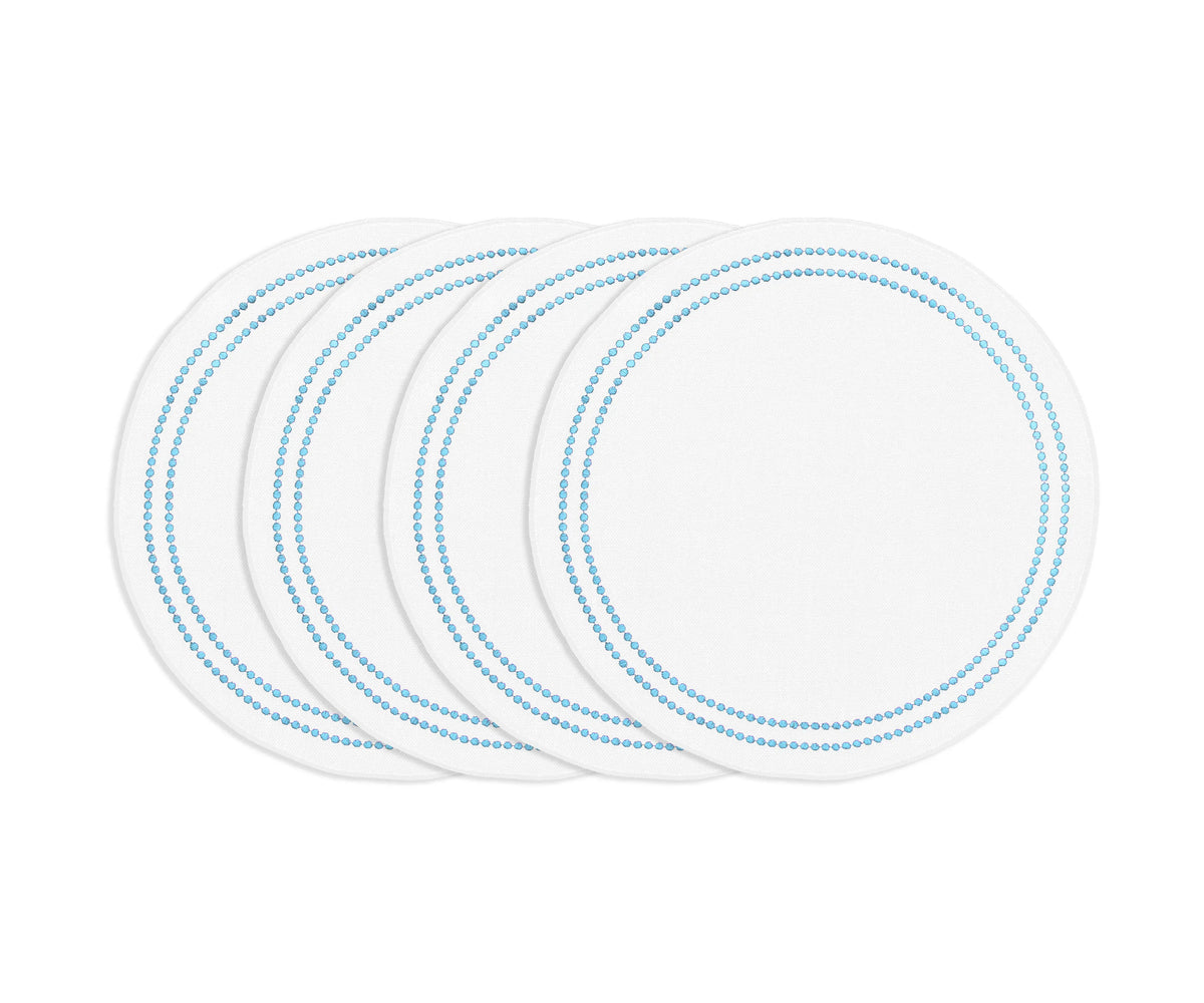 Light blue round cotton placemat with white embroidery and pearl accents, soft washable embroidered table mat for dining.