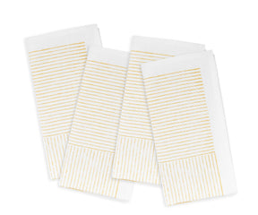 Durable fabric napkins folded for an outdoor dining setup	