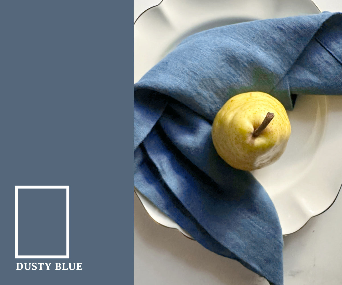 Muted dusty blue color napkins with a soft, understated shade that adds a calm and sophisticated touch to table settings