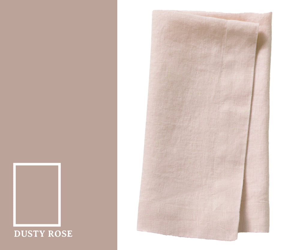 Soft dusty rose color napkins with a muted pink hue that adds a romantic and elegant touch to table settings.