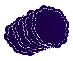 Blue placemats with scalloped edges for round dining tables