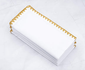 Elegant white wedding napkin featuring a shell edge and gold trim