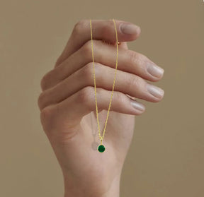 Elegant round gold-plated pendant on chain, emerald gemstone necklace may birthstone jewelry