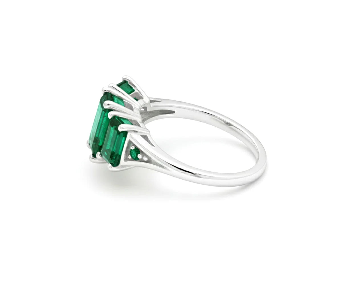Classic emerald ring with white zircon stones in luxury design
