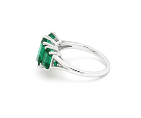 Classic emerald ring with white zircon stones in luxury design