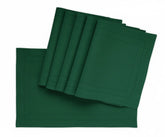 Evergreen 100 cotton hemstitch placemats on a holiday dining table

