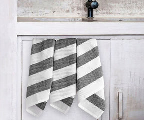 A single reliable dish towel, ready to handle any spills or messes with ease.