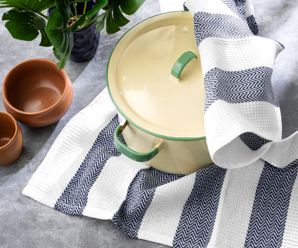 Classic cotton dish towel, providing durability and functionality for everyday use.