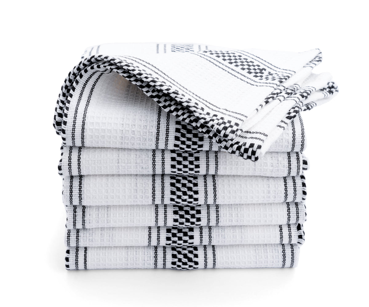 A pile of black kitchen hand towels with white stripes