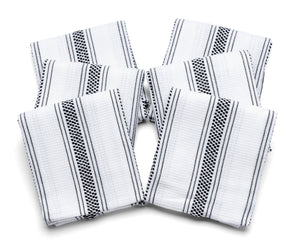 Set of black and white striped kitchen hand towels neatly arranged