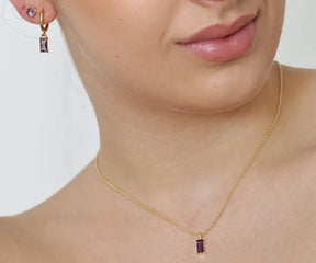 Jewelry close-up showing 13.5mm rectangle pendant and chain