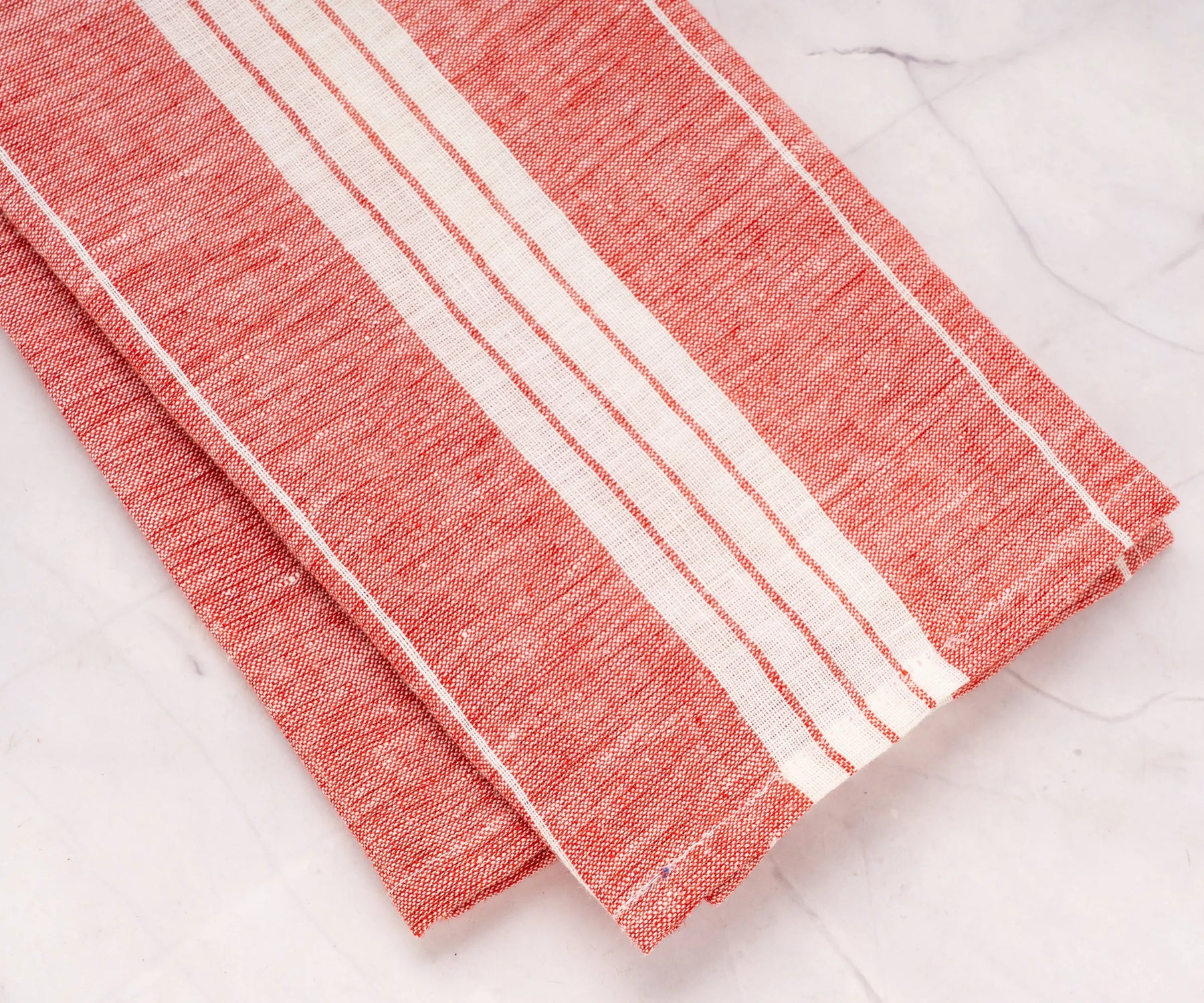 Durable red linen kitchen towels folded on counter, set of 2