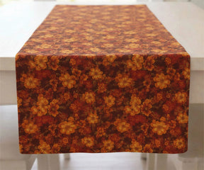 Orange floral patterned tablecloth on a rectangular table