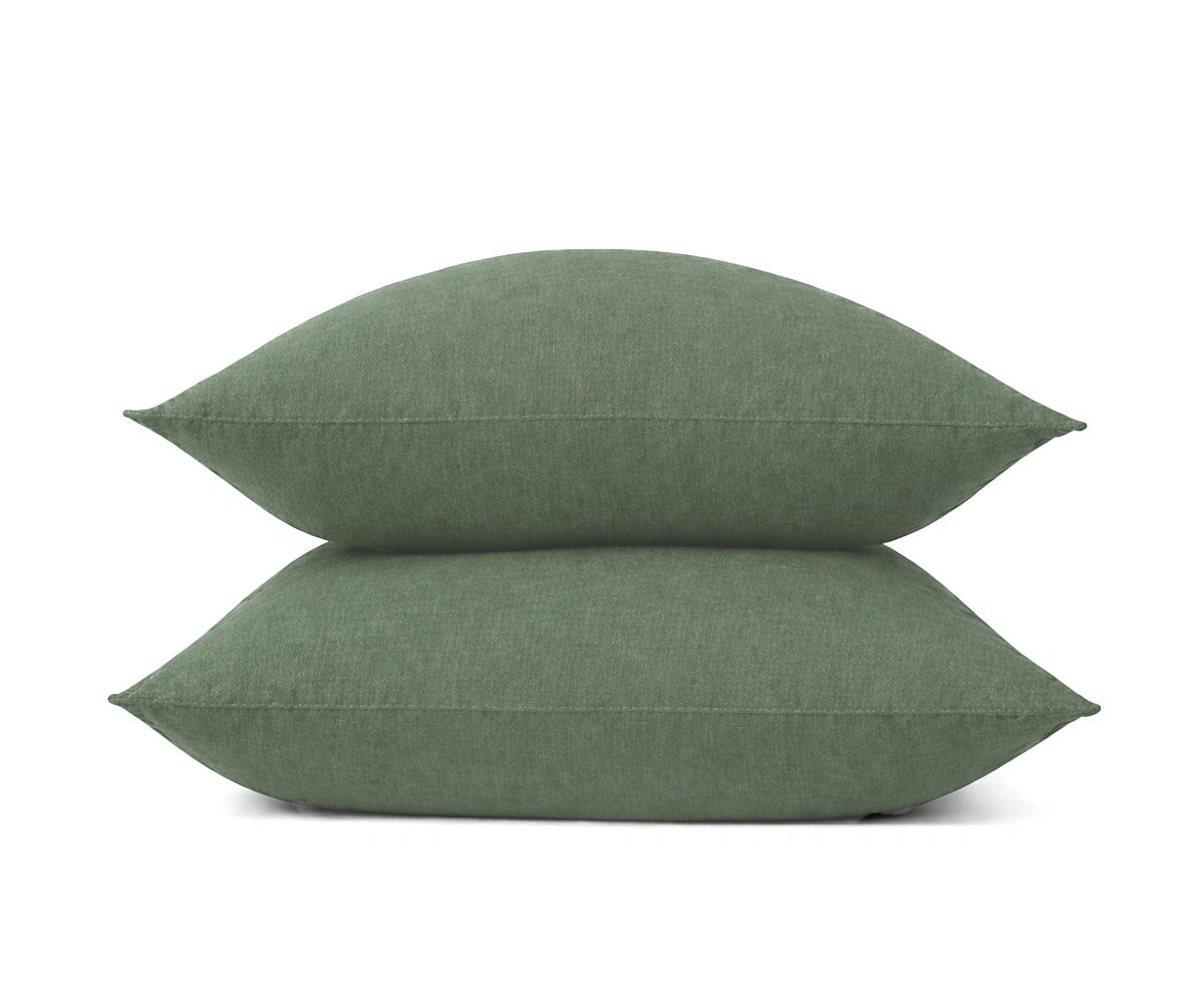 Forest green linen pillow covers in 100% natural linen, breathable durable pillowcases with a relaxed texture for rustic and contemporary interiors