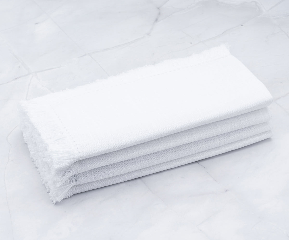 White hemstitch napkins offer a timeless and versatile option for table settings, 