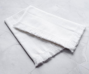 white edge napkins are often associated with warmth and festivity