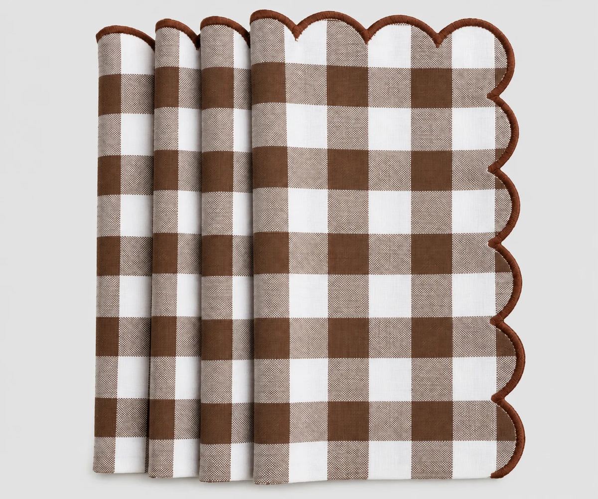Set of brown and white gingham cotton dinner napkins with red scalloped embroidered edges