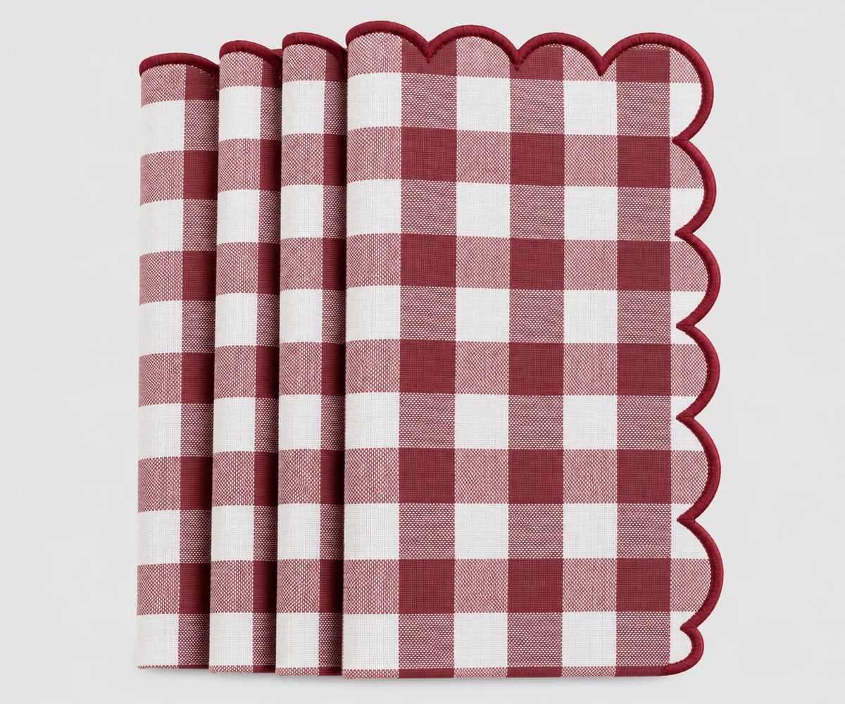 Set of dark red and white gingham cotton dinner napkins with red scalloped embroidered edges