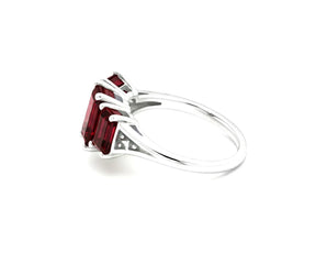 Red gemstone garnet ring with zircon accents in stylish design