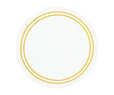 Gold dot white cotton placemats for elegant dining table decor.