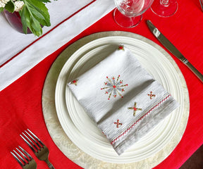Elegant Red Embroidered Napkins: Elevate your table setting with these finely crafted embroidered napkins.