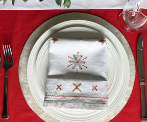 Elegant Red Embroidered Napkins: Elevate your table setting with these finely crafted embroidered napkins.