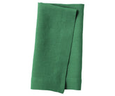 Grass green plain linen napkin with vibrant fresh tone, displayed on table setting