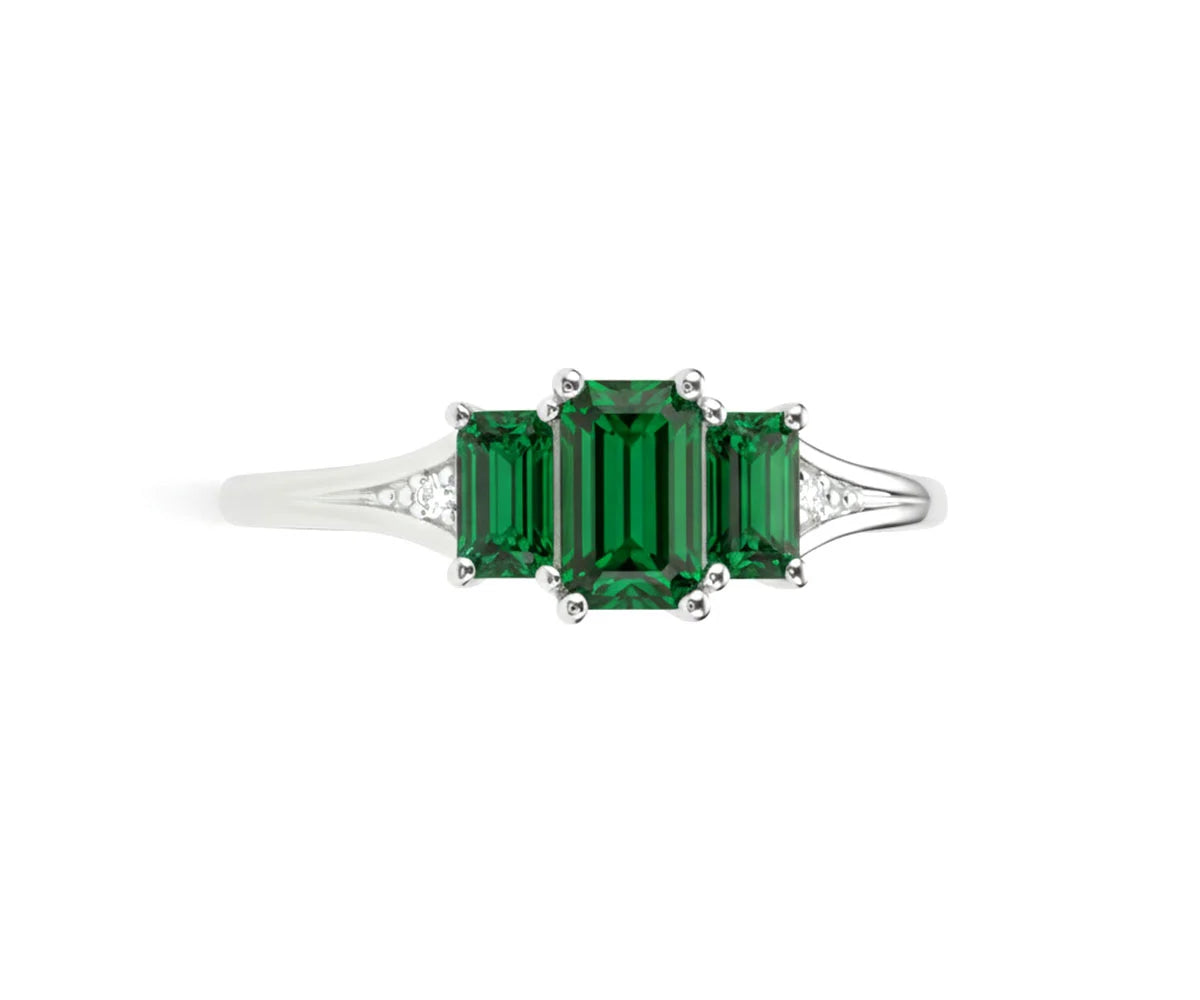 Beautiful emerald ring with white zircon stones for daily wear