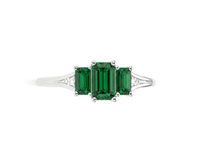 Beautiful emerald ring with white zircon stones for daily wear