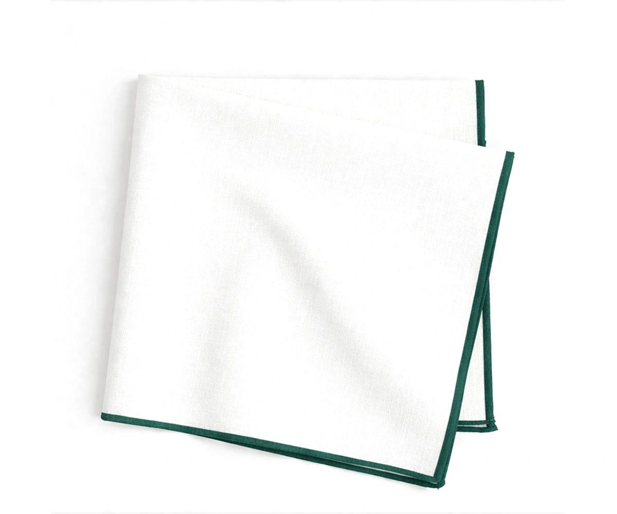 White cotton napkins with green merrow stitch trim, embroidered napkins for fresh and everyday table styling