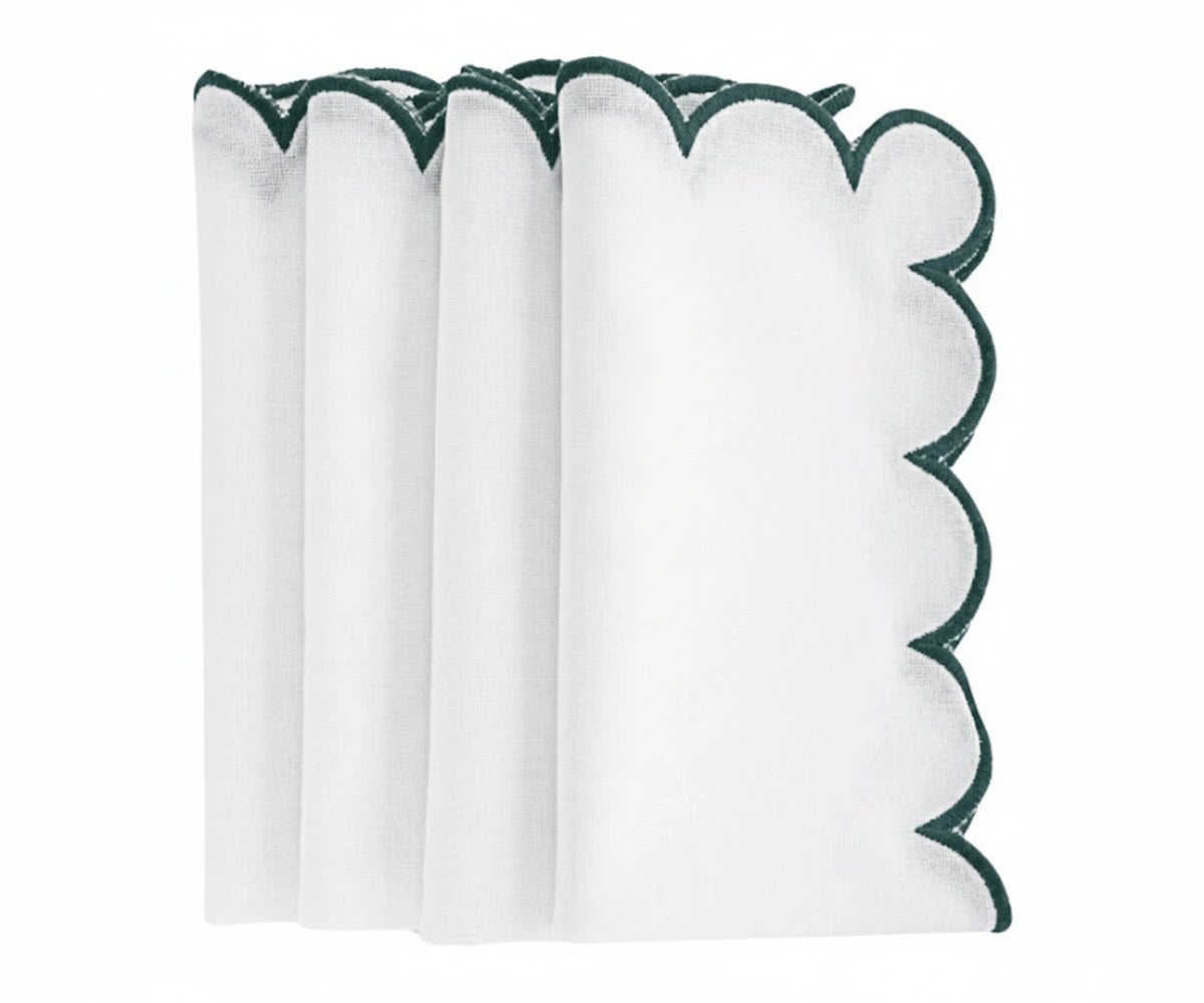 Dining table setup with green and white cotton napkin, soft cloth