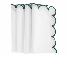 Dining table setup with green and white cotton napkin, soft cloth
