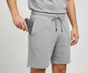 Lightweight grey men’s shorts in 100% knitted cotton, designed for comfort and style, perfect for workouts, travel, or home wear
