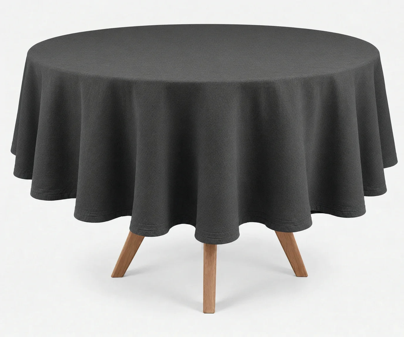 Grey round linen tablecloth with elegant drape, presented on a round wooden dining table