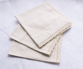 Soft cotton napkins, gentle on the touch, provide a comfortable and cozy addition to your dining decor.