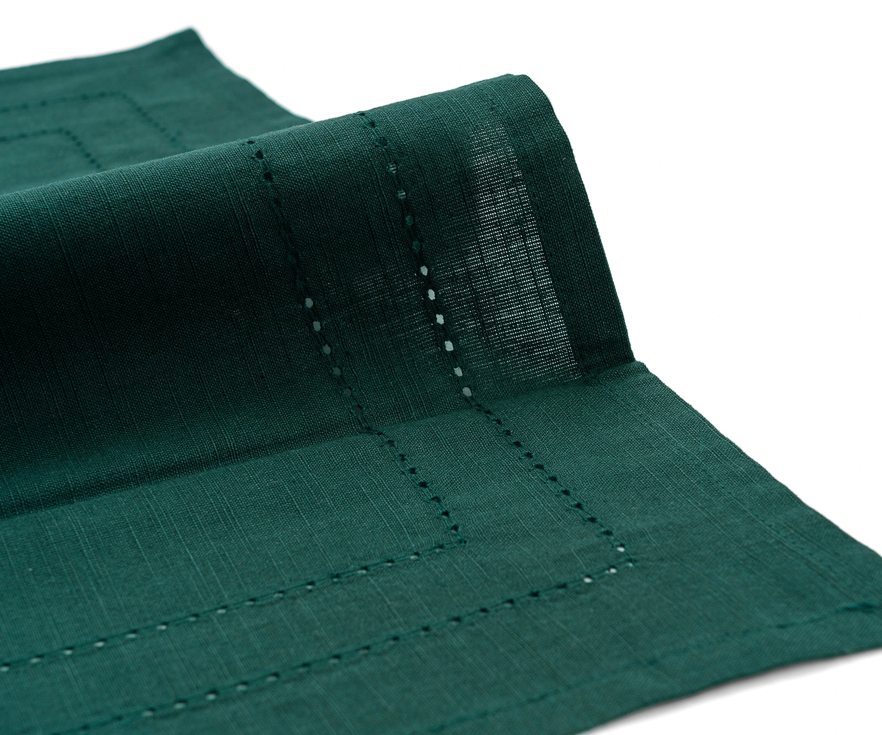 Forest Green napkins displayed with matching placemats