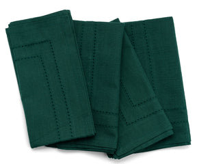 Forest Green napkin with elegant tableware setup