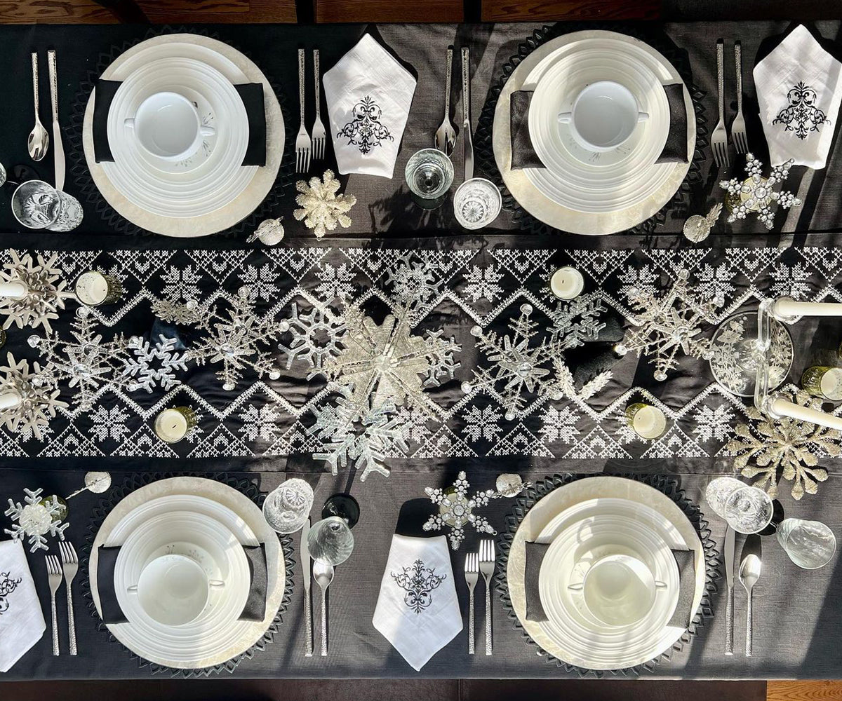 "Elevate with gray, embrace spring's bloom, and celebrate holidays with our diverse tablecloth collection."