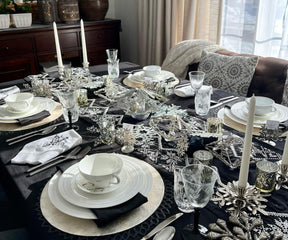 "Elevate with black, bloom in springtime joy, and celebrate holidays using our distinctive tablecloth collection."