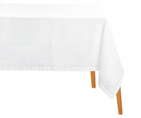 White hemstitched cotton-linen rectangle tablecloth on dining table