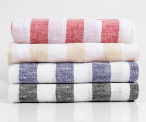 Neatly stacked Italian Stripe Napkins in all colors, ready for use