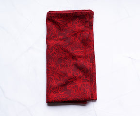 Red DInner Napkins: The intensity and shade of red can vary from bright and vibrant to deeper and more muted tones, depending on the manufacturer's design.