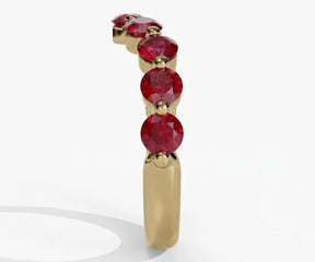 Red ruby engagement ring with round cut stone