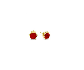 Side view of ruby stud earrings with secure push-back closure on white background