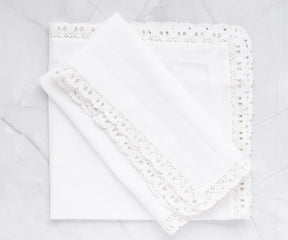 Set of 6 white cotton napkins, a versatile and practical solution, effortlessly elevates your table decor.