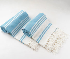 Striped Turkish towels made from 100% cotton for quick-drying comfort

