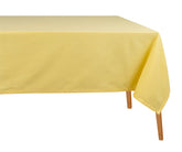 Lemon yellow 100% cotton rectangular tablecloth on dining table