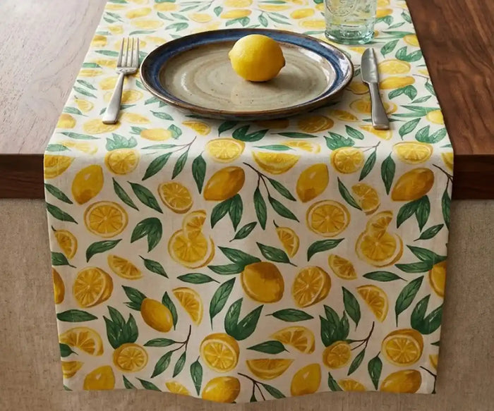 Lemon yellow printed table runner crafted from 100% cotton, decorative table linen perfect for farmhouse tables, summer dining, kitchen décor, and seasonal gatherings.